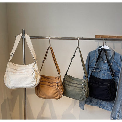 Distressed Canvas Messenger Bag - Multi-Zipper Layered Design