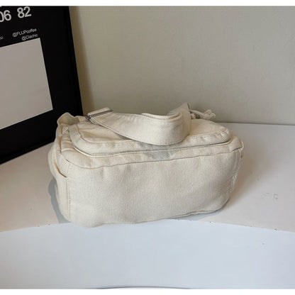 Distressed Canvas Messenger Bag - Multi-Zipper Layered Design