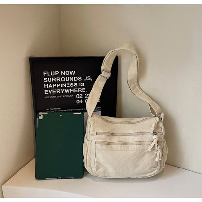 Distressed Canvas Messenger Bag - Multi-Zipper Layered Design