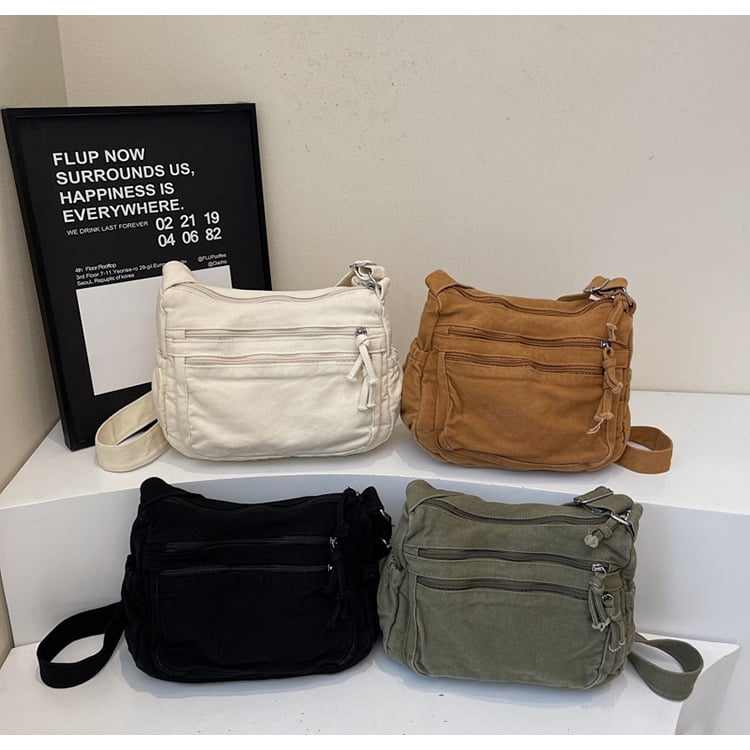 Distressed Canvas Messenger Bag - Multi-Zipper Layered Design