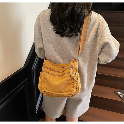 Distressed Canvas Messenger Bag - Multi-Zipper Layered Design