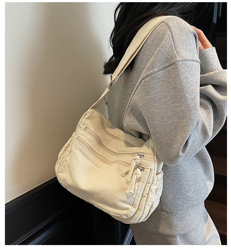 Distressed Canvas Messenger Bag - Multi-Zipper Layered Design
